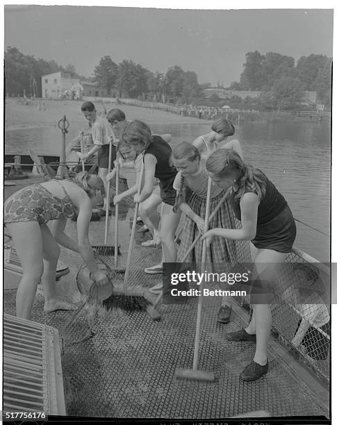 Barging Off For The Summer. There are certain housekeeping chores which are taken care of by the boys and girls on the Heinrich Zille. While the...