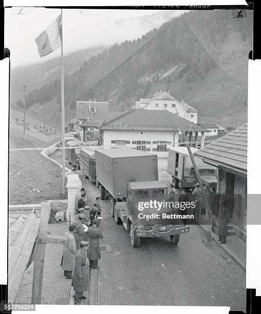 American Troops in Italy. Brenner Pass, Italy: A train of military trucks, transporting American Amry Troops, crosses the Italo-Australian border at...