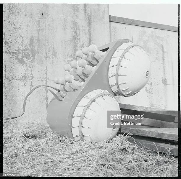 "Baby Rhino" Unveiled. Indianapolis: Tilted upward at a dizzy angle, the "Baby Rhino" and its nine puppet passengers hurdle a pile of timbers almost...