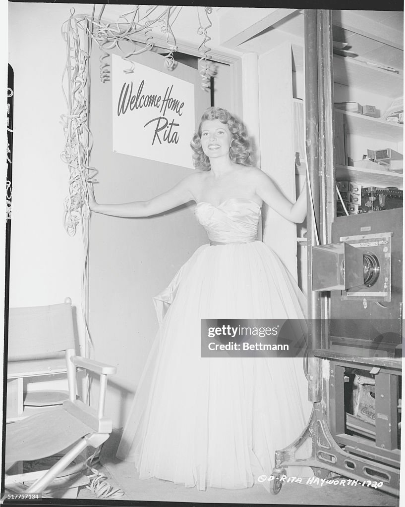 Rita Hayworth Standing In Doorway