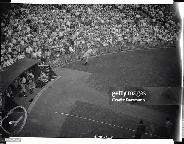 The sequence camera caught Giants third baseman Bobby Thomson snaring Dodgers first baseman, Gid Hodges foul fly along the 3rd base box seats in the...