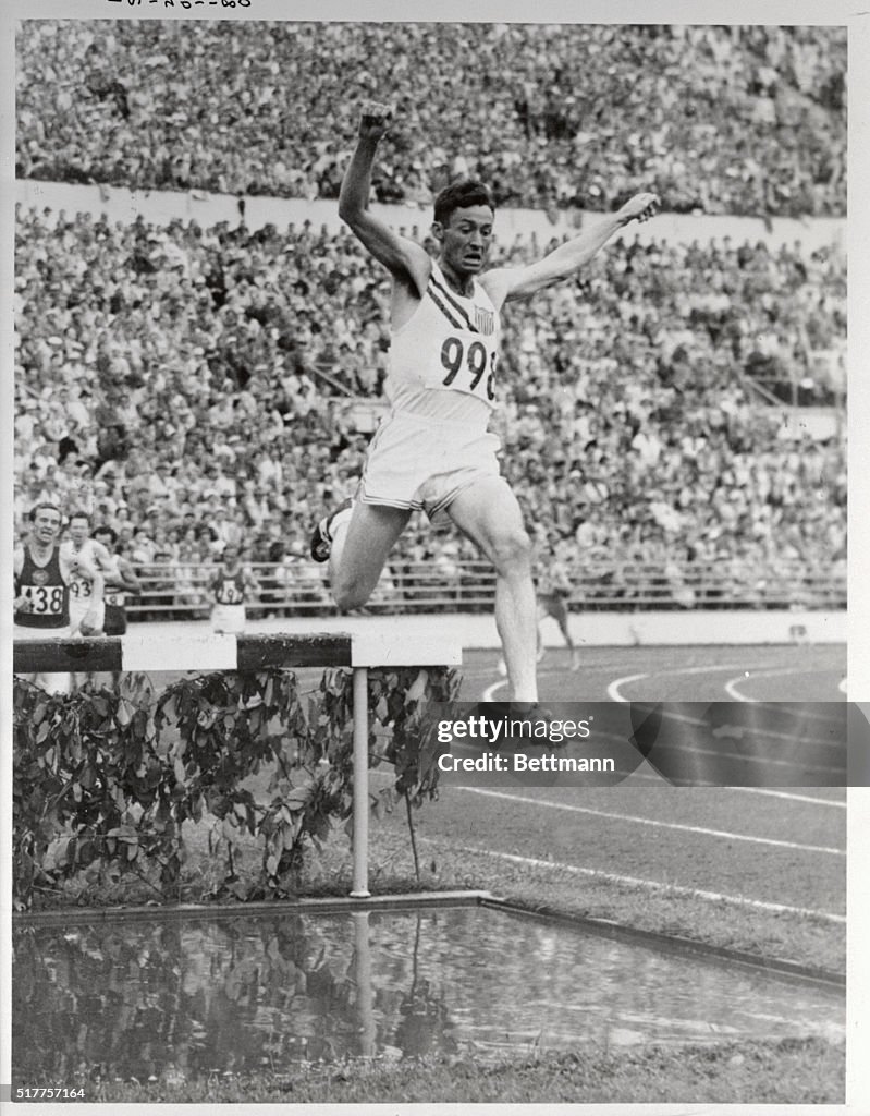 Horace Ashenfelter Jumping Hurdle at The Olympics