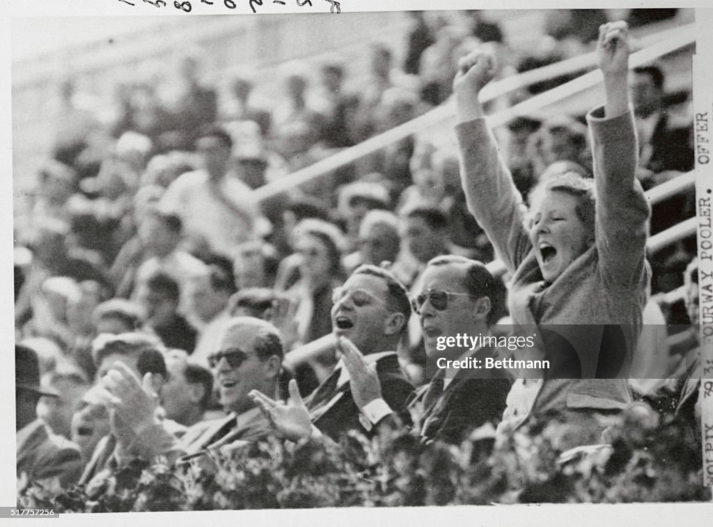 Princess Beatrix Jumping for Joy in Crowded Stadium