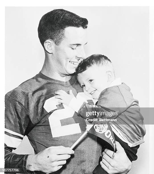 November 13th is "Dad's Day" at the University of Oklahoma, but it's Dad's day 365 times a year for one-year-old Pat Leake, giving a fond hug to his...