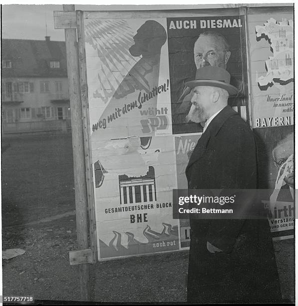 Walking past a poster with a silhouette very similar to his own profile, Dr. Alois Hundhammer has no doubt about who is referred to in the slogan...