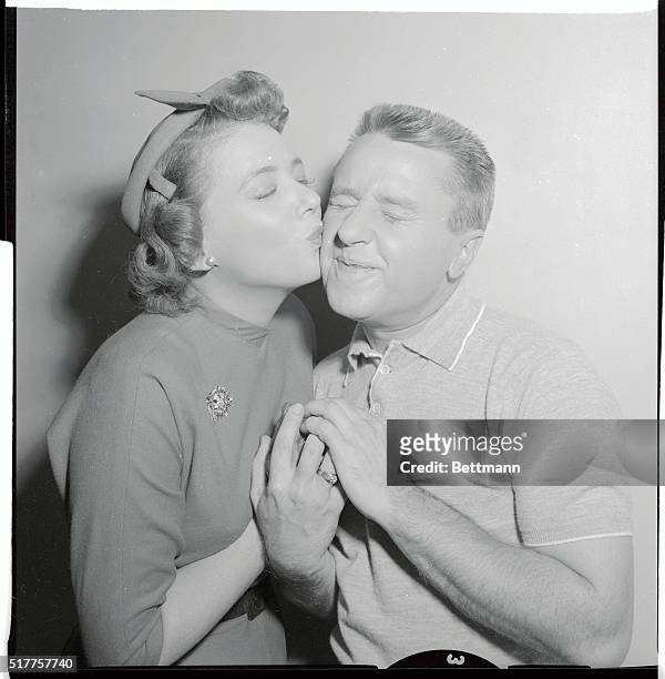 Kiss from his TV wife Alice causes comedian George Gobel to wince. Could be he's remembering that his real wife Alice is usually watching in the...