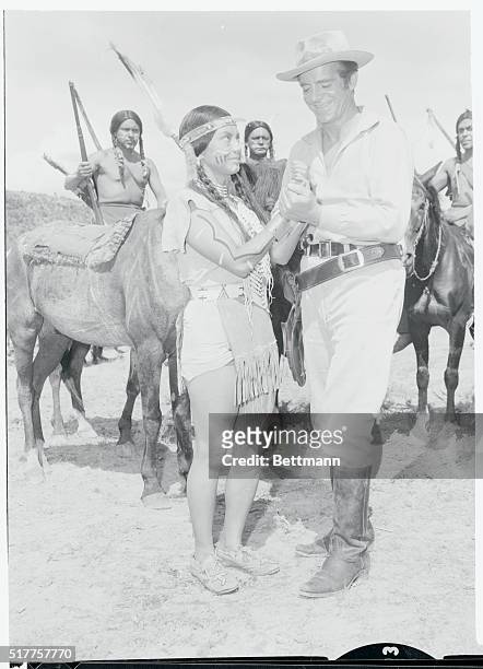 She's No Brave. Durango, Mexico: A manicured Comanche draws a smile from actor Dana Andrews on a movie set near Durango, Mexico. Owner of the tinted...