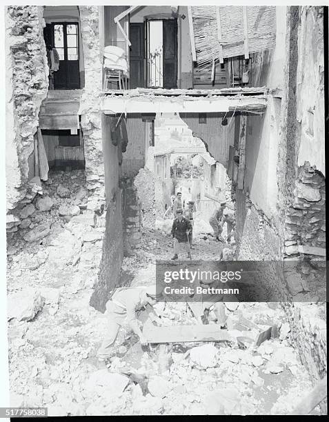 Open house...Both sides of this house were swept away, giving a view of Villa San Sebastiano, Italy, which was devastated by floods and landslides....