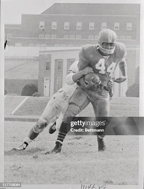 Jim Brown, of Manhasset, Long Island, who is know as "First Down," as the big gun in Syracuse's upset of Maryland. He rushed for a total of 154 yards...