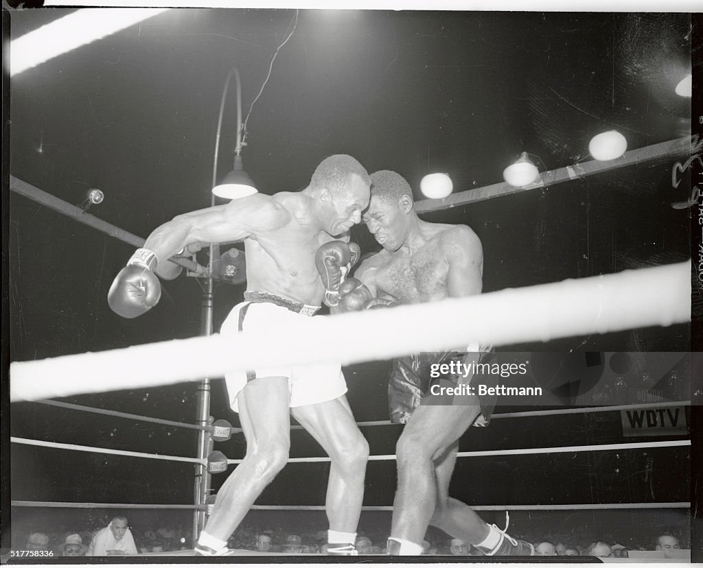 Ezzard Charles and Jersey Joe Walcott Boxing