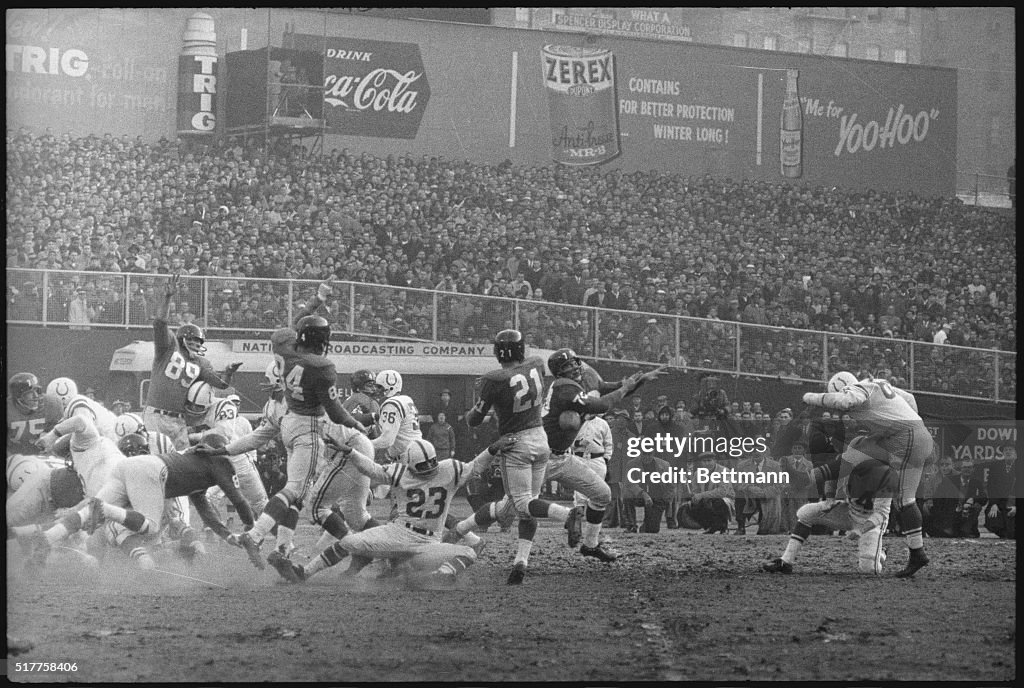 Steve Myra, Carl Larilivacz and George Shaw on Yankee Stadium Field