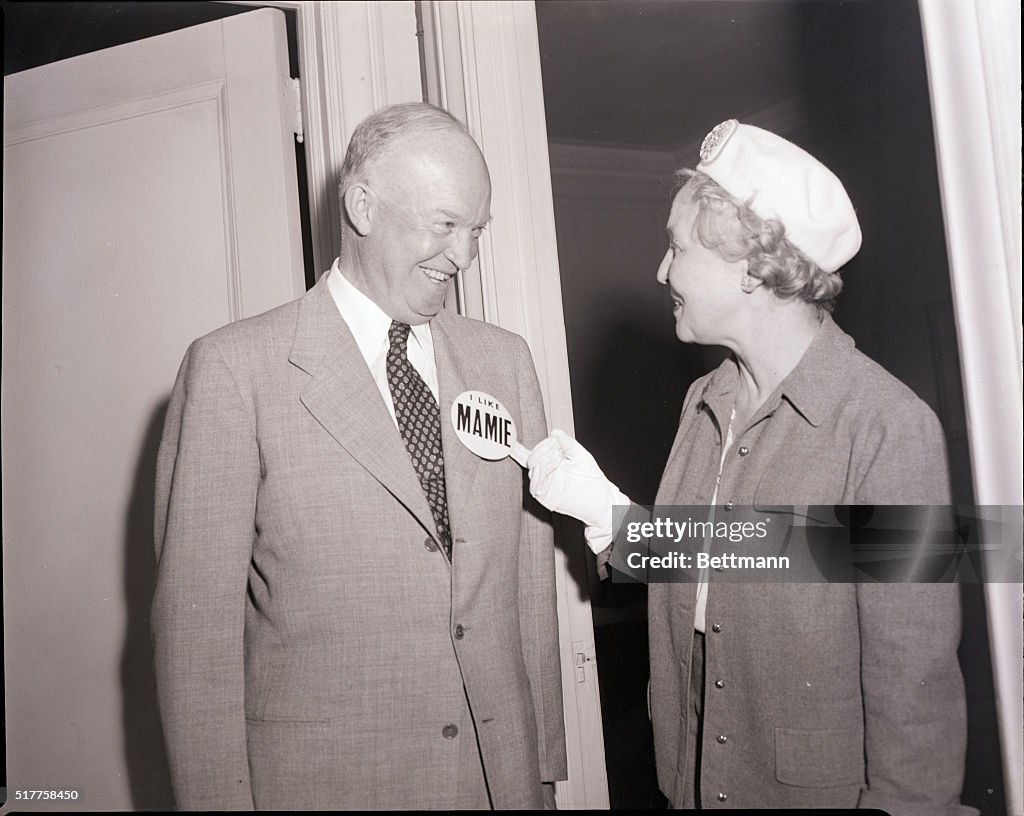 Woman Pins Button on Dwight Eisenhower