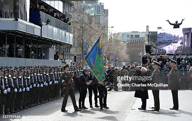 The President of Ireland, Michael D Higgins inspects the troops outside the General Post Office Building during the 1916 Easter Rising commemoration...