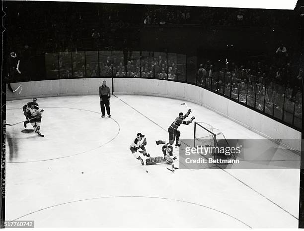 The New York Rangers faced the Montreal Canadiens tonight at Madison Square Garden. In first period action, Ranger goalie Lorne Worsley falls to the...