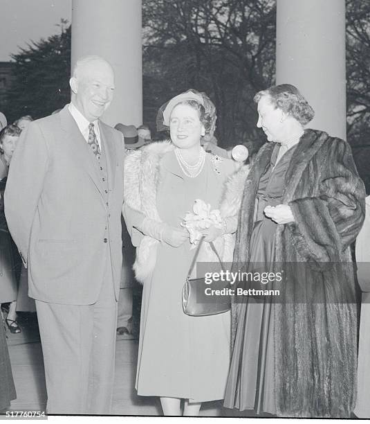 President and Mrs. Eisenhower are shown with Queen Mother Elizabeth as they greeted her on arrival at the White House yesterday for a week's visit....