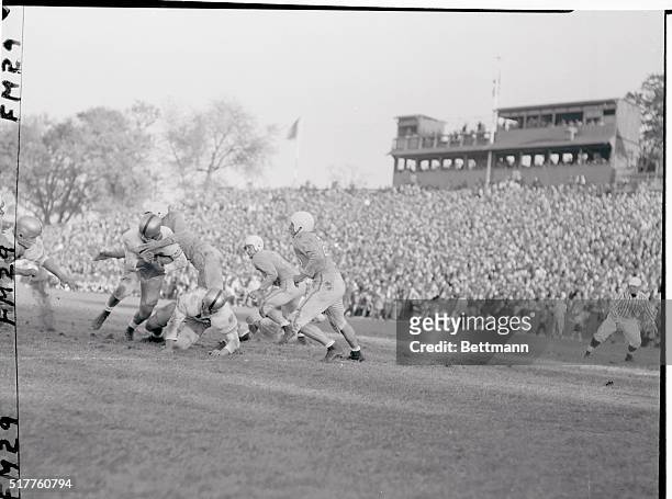Army's Pat Uebel is shown scoring a touchdown in the third quarter of today's game against Columbia at Baker Field. Trying to tackle Uebel is...