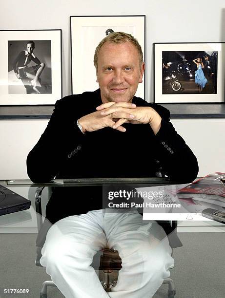 Fashion designer Michael Kors poses for a portrait in his Manhattan office August 19, 2004 in New York City.