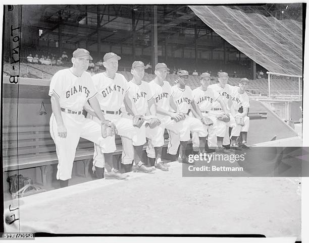 Left to right: Coach Rhodes, Coach Elliot, Davey Williams, Alvin Dark, Henry Thompson, Sal Yvars, Whitey Lockman, and Bob Thomson.