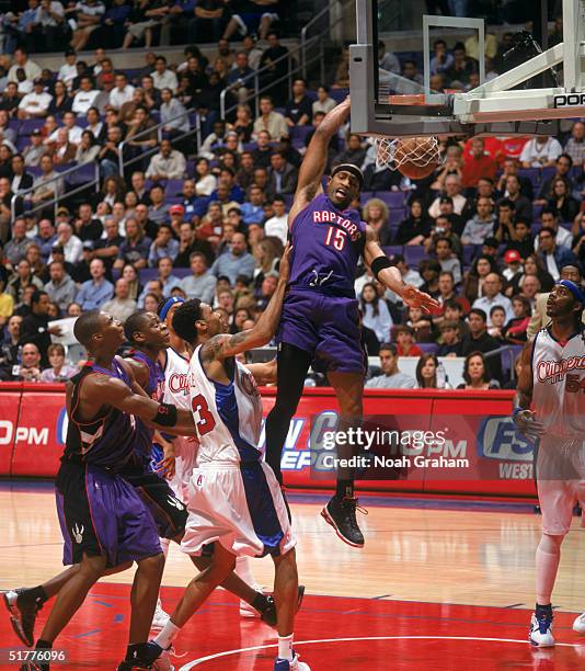 Vince Carter of the Toronto Raptors dunks during the game against the Los Angeles Clippers at Staples Center on November 16, 2004 in Los Angeles,...