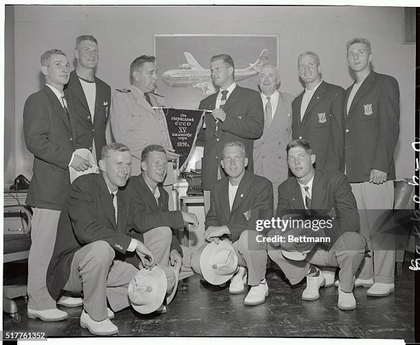 The U.S. Naval Academy rowing team, the winner of the eight man rowing race at the Helsinki Olympics, shown here, arrived at New York International...