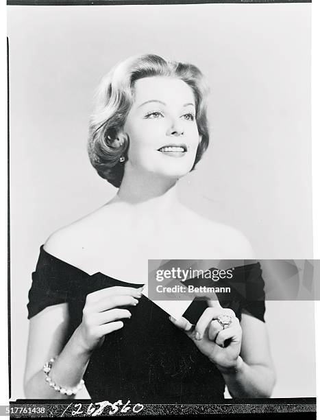 Arlene Dahl's lips and natural beauty mark alongside her mouth have been incorporated into one of Hollywood's most glamourous calling cards. The...