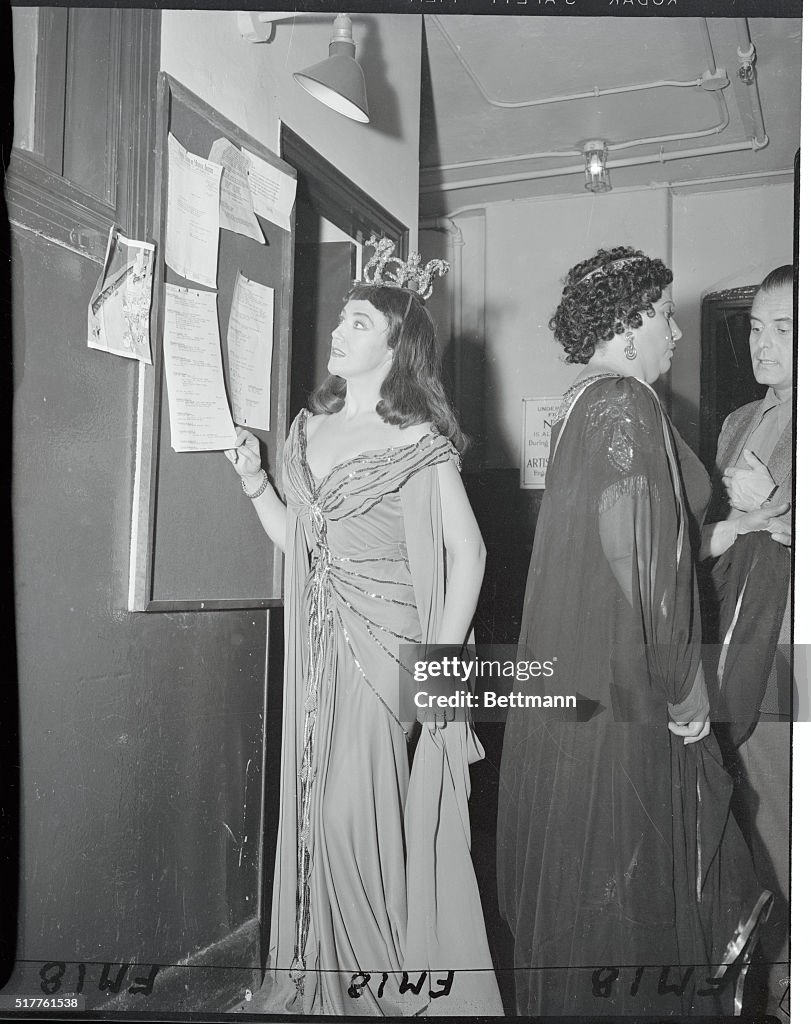Zinka Milanov Reading a Bulletin Board