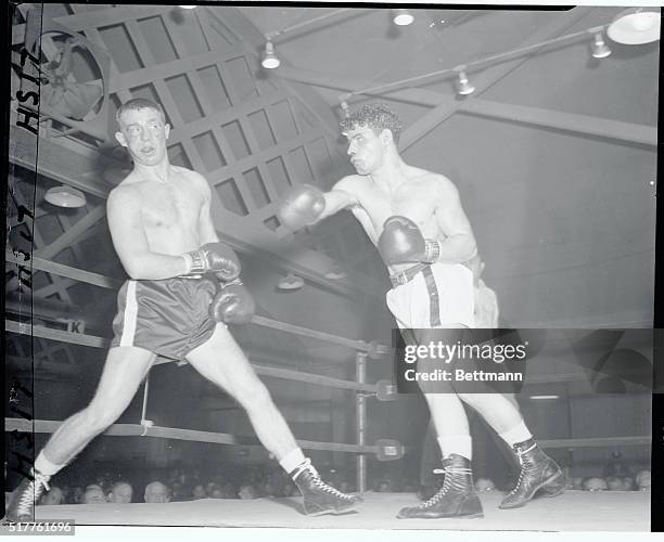 Welterweight Joey Klein pursues bruised and battered Gerald Dreyer in the seventh round of their scheduled ten rounder at the Eastern Parkway Arena...