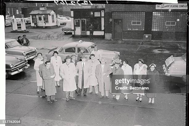 The seven men and five women who comprise the jury at the trial of Dr. Samuel Sheppard are shown as they arrived at court this morning to begin their...