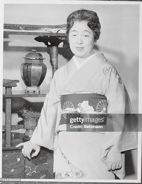 Dressed in a comparatively simple "Kimono," Japan's Empress Nagako reflects the serenity of her life as she poses for her 58th birthday portrait.