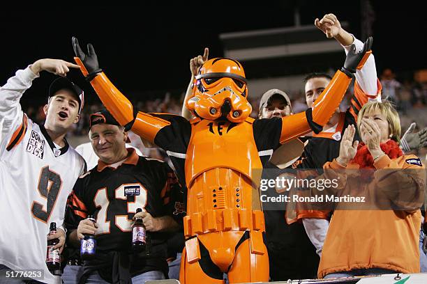 Fans of the Cincinnati Bengals dressed in costume support their team during the game against the Denver Broncos on October 25, 2004 at Paul Brown...