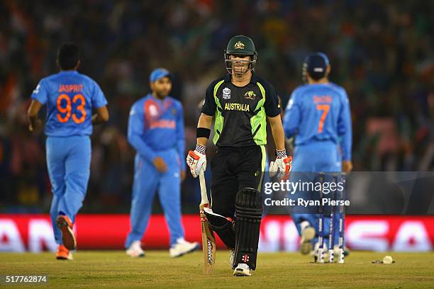 David Warner of Australia looks dejected after being dismissed by Ravichandran Ashwin of India during the ICC WT20 India Group 2 match between India...