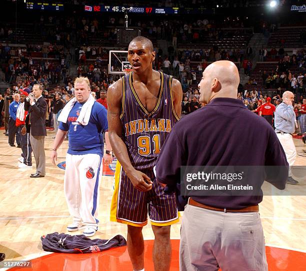 Ron Artest of the Indiana Pacers is shown on the court during a melee involving fans during a game against the Detroit Pistons November 19, 2004 at...