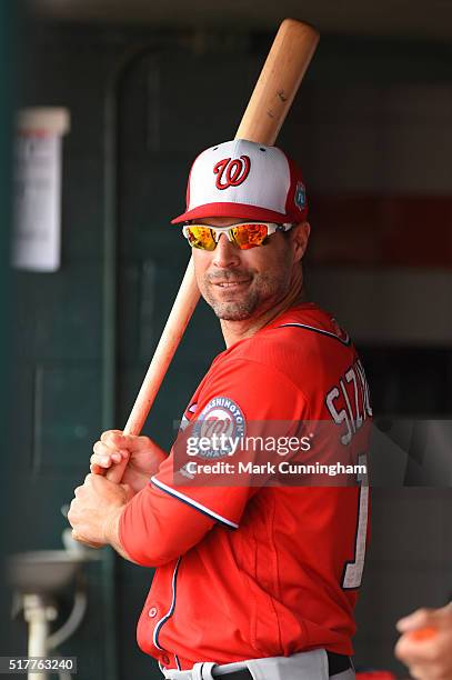 Scott Sizemore of the Washington Nationals looks on from the dugout during the Spring Training game against the Detroit Tigers at Joker Marchant...