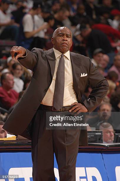 Assistant coach Garfield Heard of the Detroit Pistons, filling in for Larry Brown, gestures on the sideline during the game with the Philadelphia...