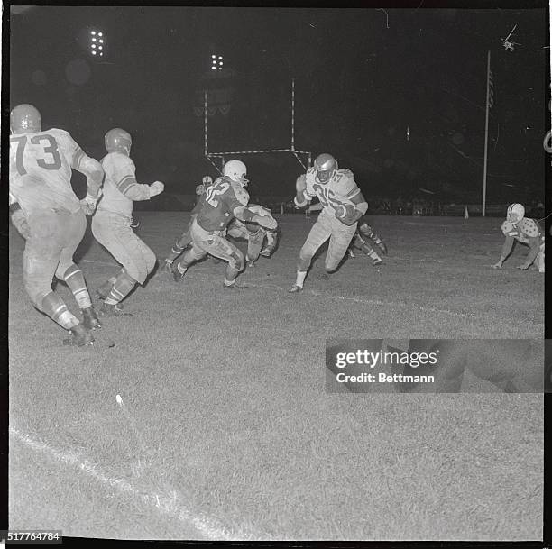 Eagles' Ted Dean , returns punt for 20-yards in the fourth quarter of College All-Stars, Philadelphia Eagles game here 8/4. Making a grab, and the...