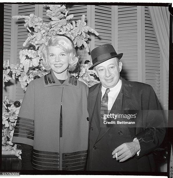 Showman Billy Rose and his former wife Joyce Matthews, are shown here December 29th shortly before they were married for the second time. The quiet...