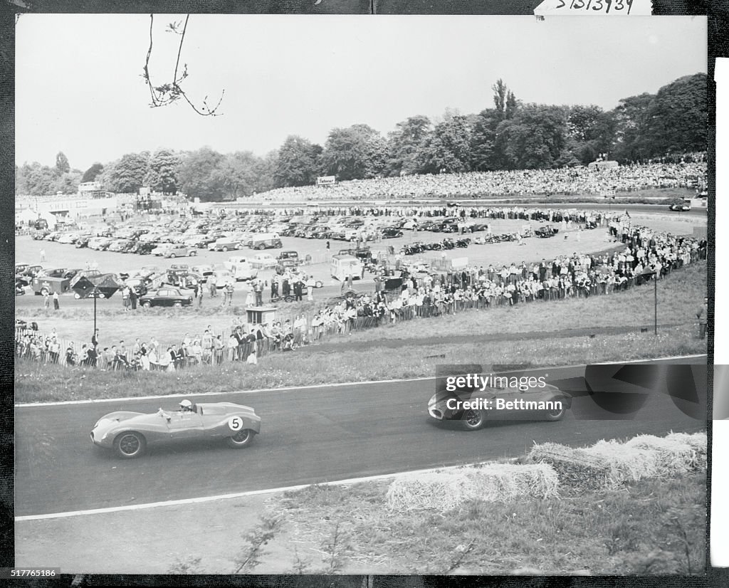 View of Race Cars in Action on Speedway