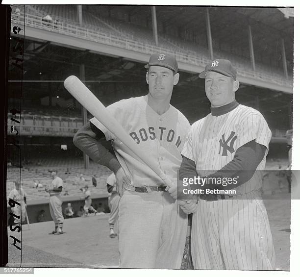 Big Ted Williams, slugging ace of the Boston Red Sox meets his counterpart on the Yankee roster, mighty Mickey Mantle, before doing battle in a...