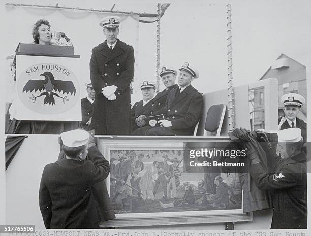Newport News, VA.: Mrs. John Connally, wife of the former Secy. Of Navy, and sponsor of the nuclear submarine Sam Houston, presents an oil painting...
