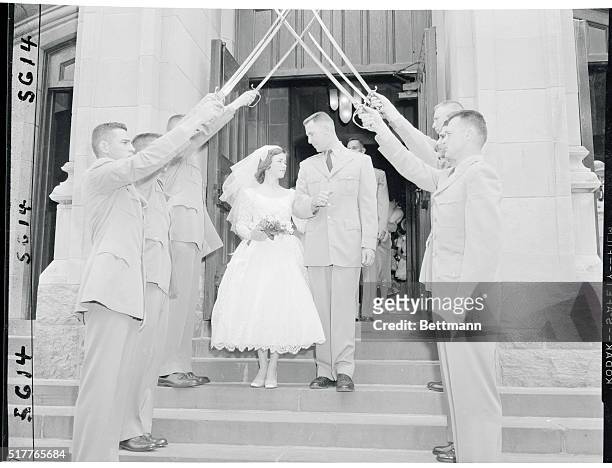 Military wedding. West Point, New York: Cadet Rufus Hart, of Alexandria, Va., and his bride, the former Barbara Rising, of San Francisco, Calif.,...