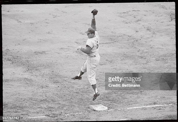 Pittsburgh, Pennsylvania: Dodgers' Ron Fairly with a great catch makes an out on Pirate thirdbaseman, Don Hoak, in the fourth inning of the first of...