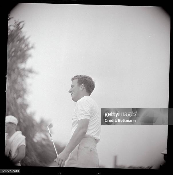 Australia's Peter Thomson, five time British Open champion, putting on the green.