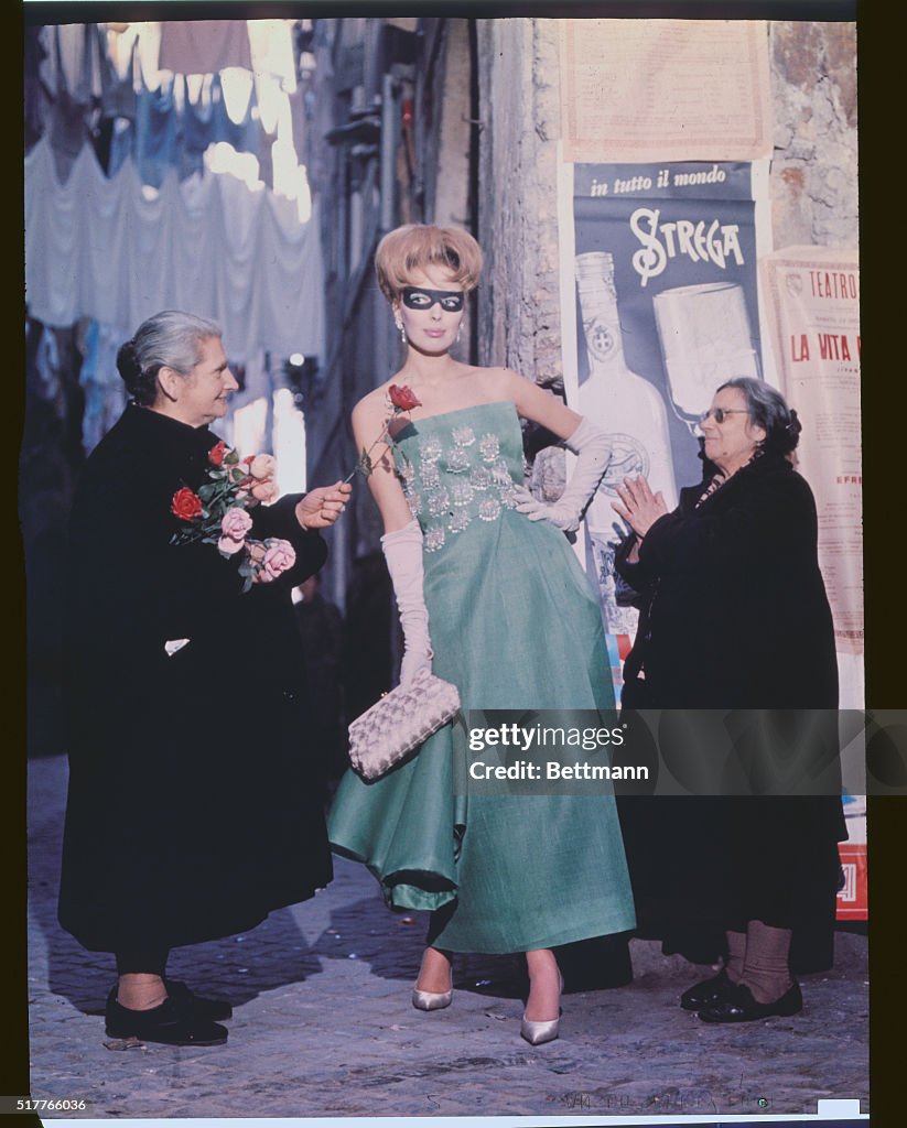 Model Posing in Green Organza Gown