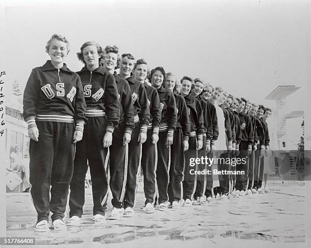 Members of the U. S. Olympic swimming and diving teams are shown lined up beside the Olympic Pool at Helsinki. Left to right are: Carol Frick of the...