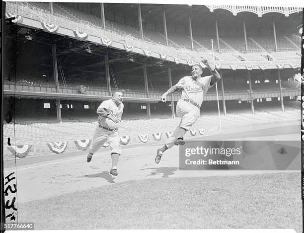 Dodgers' Opening Power at the Stadium. New York, New York: The Brooklyn Dodgers took to the field today but only for practice as they invaded the...