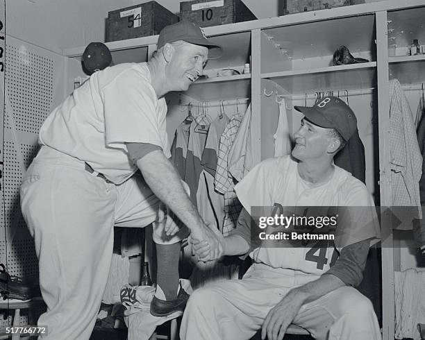 Brooklyn, New York, New York: Brooklyn Dodgers manager Walt Alston shakes hands with Roger Craig.