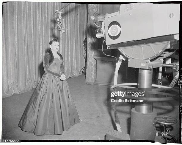 Judy Garland rehearses here for her TV debut at CBS Television City in Hollywood. She'll stepped before the TV cameras for the first time on...