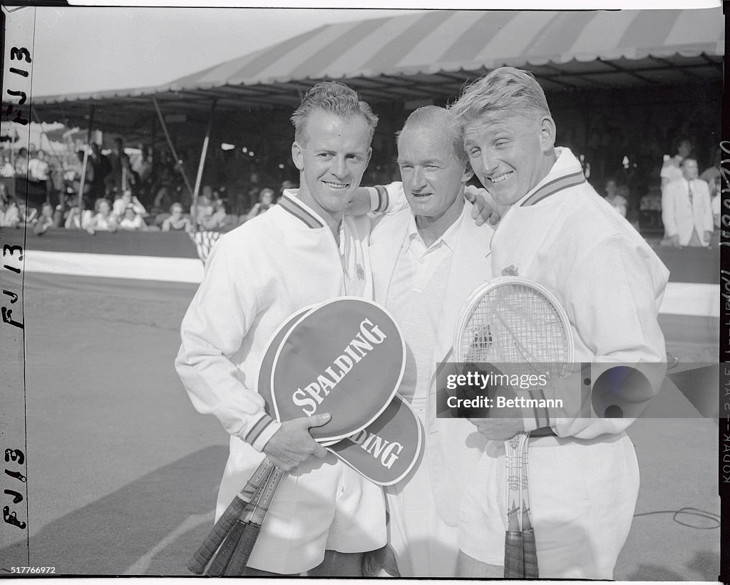 Tennis Players Linking Arms in Victory
