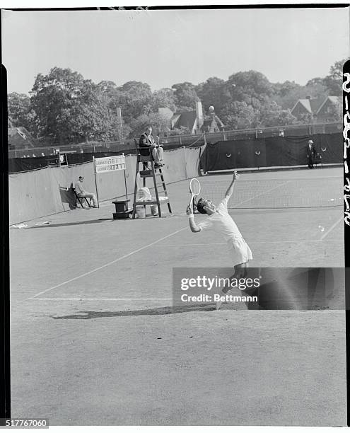 Shining Exception. Forest Hills, New York: Sammy Giammalva, 21-year-old Texan, is shown as he begins his service today in match against Sid Schwartz...