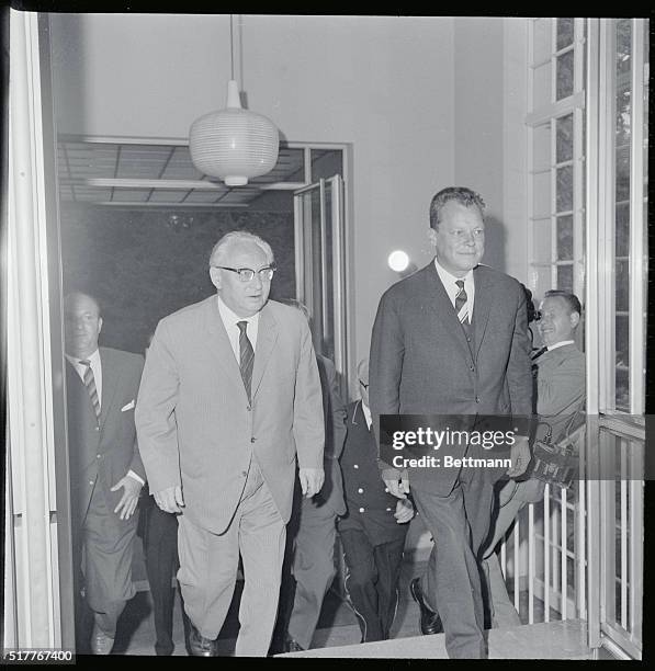 Social Democrats Meet with Adenauer. Bonn, Germany: Social Democratic party chairman Erich Ollenhauer and party chancellor candidate, Berlin mayor...